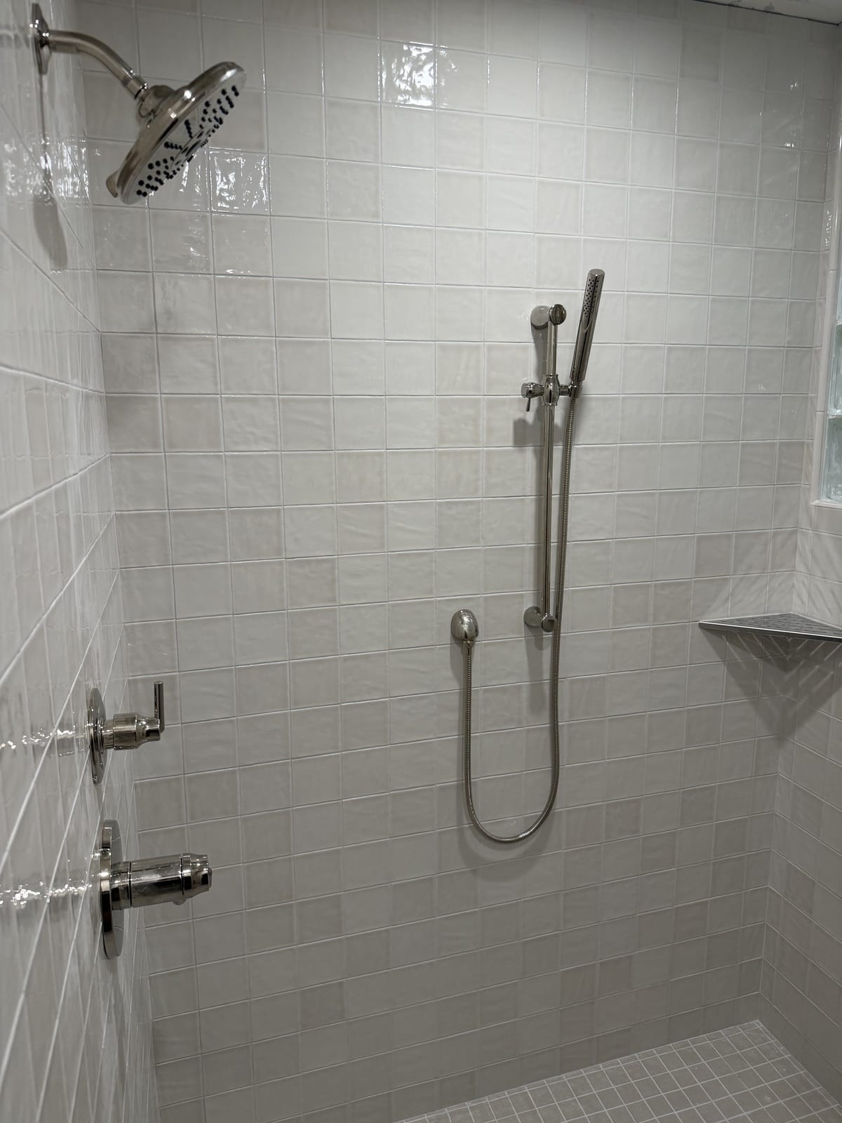 Luxury bathroom remodel with marble tile, freestanding tub, and dual showers â Rocky Mtn Remodel